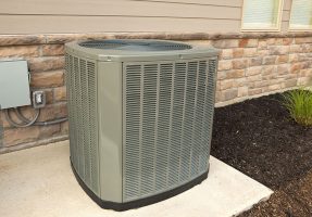 Outdoor unit of a high efficiency air conditioner or heat pump.